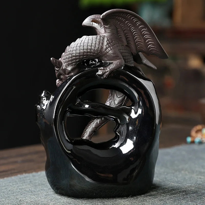 Backflow incense burner with smoke flowing through dragon design